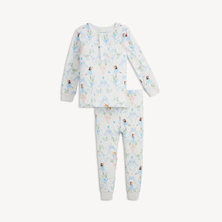 A pajama set with ballerina and bow print in soft colors, featuring a long sleeve top with ruffles and matching pants.