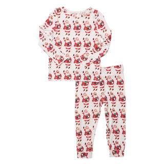 Kids pajama set featuring vintage Santa print on a white background with long sleeves and snug fit.